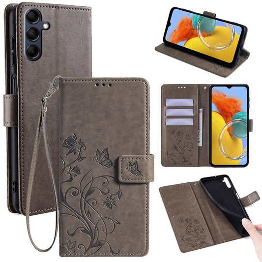 For Samsung Galaxy M14 5G Phone Case Butterfly Flower Imprinted Leather Flip Cover with Wrist Strap - Grey
