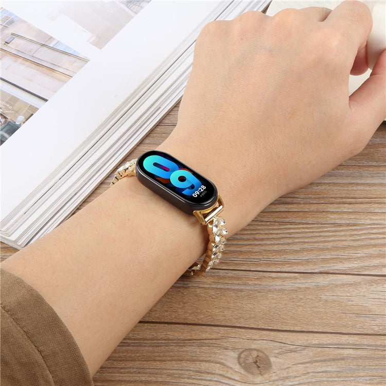 Metal Watch Strap For Xiaomi Smart Band 9 NFC  /  9  /  8 Wheat-Shaped Rhinestone Adjustable Wrist Band Replacement Bracelet - Gold