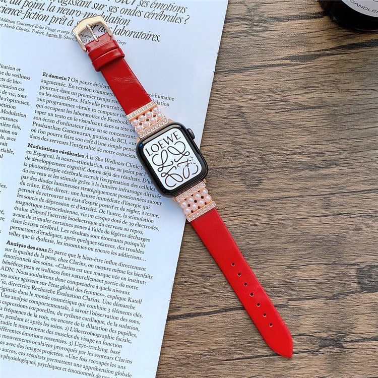 For Apple Watch Series 10 42mm / 9 8 7 41mm / 6 5 4 SE SE (2022) SE (2023) 40mm / 3 2 1 38mm Genuine Leather Pearl Rhinestone Decor Watch Band Wrist Strap - Red