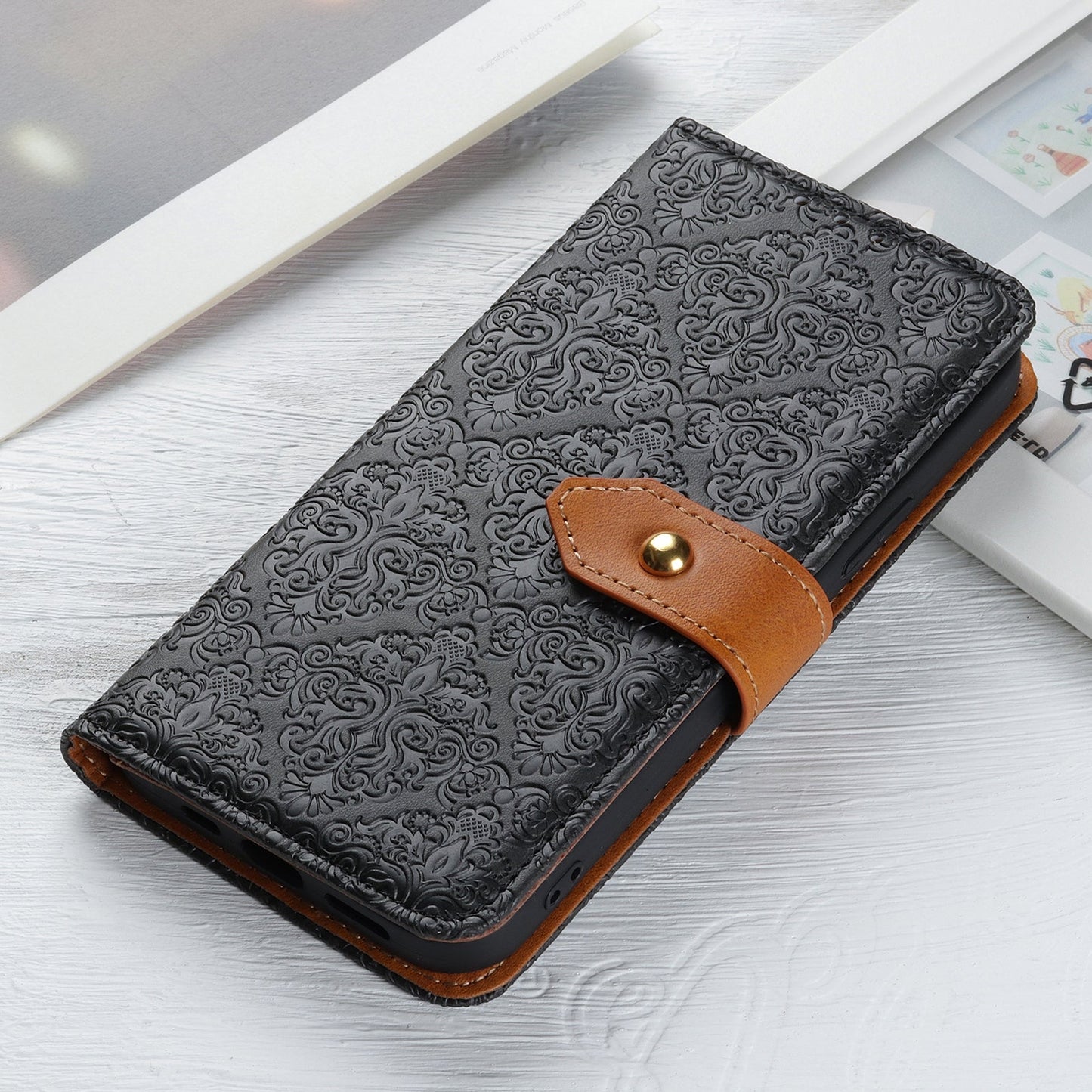 For iPhone 16e European Floral Embossed Leather Phone Case(Black)