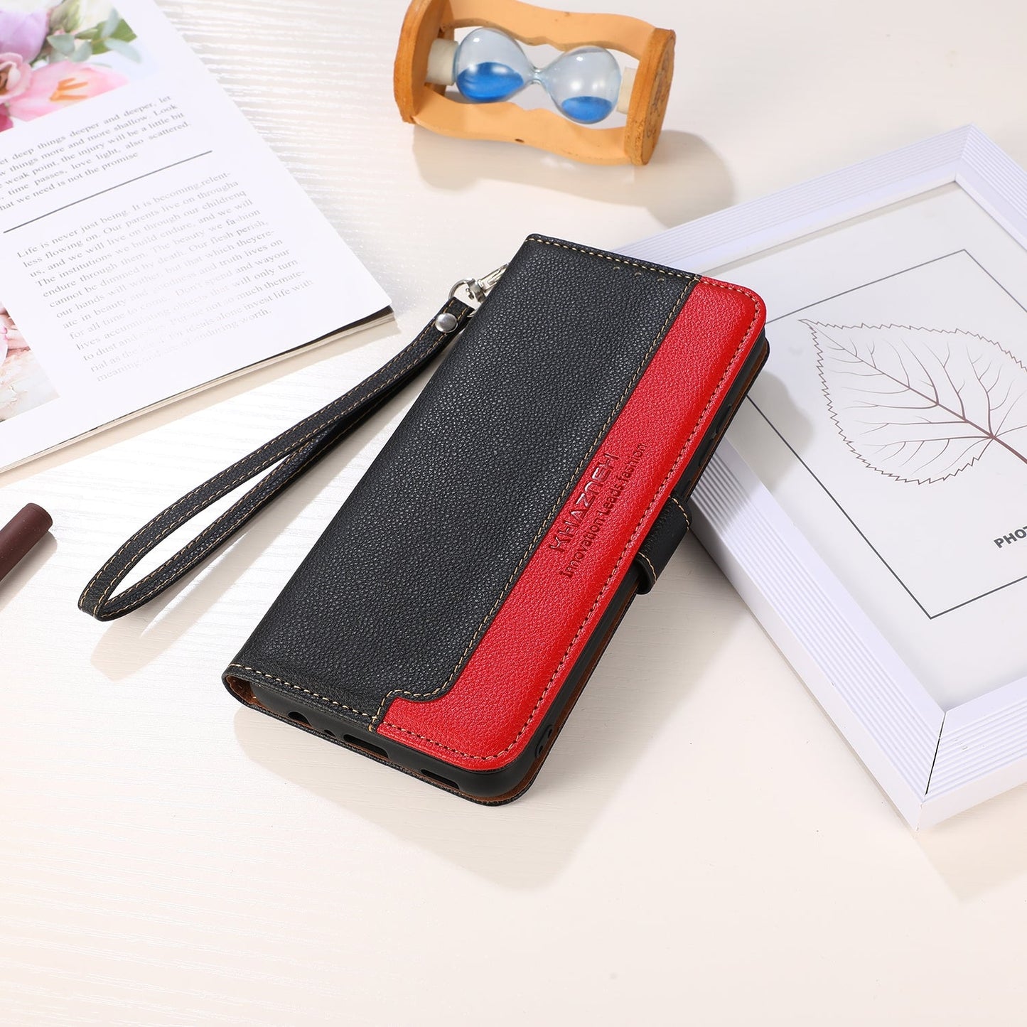 For iPhone 16e KHAZNEH Litchi Texture Leather RFID Phone Case(Black)
