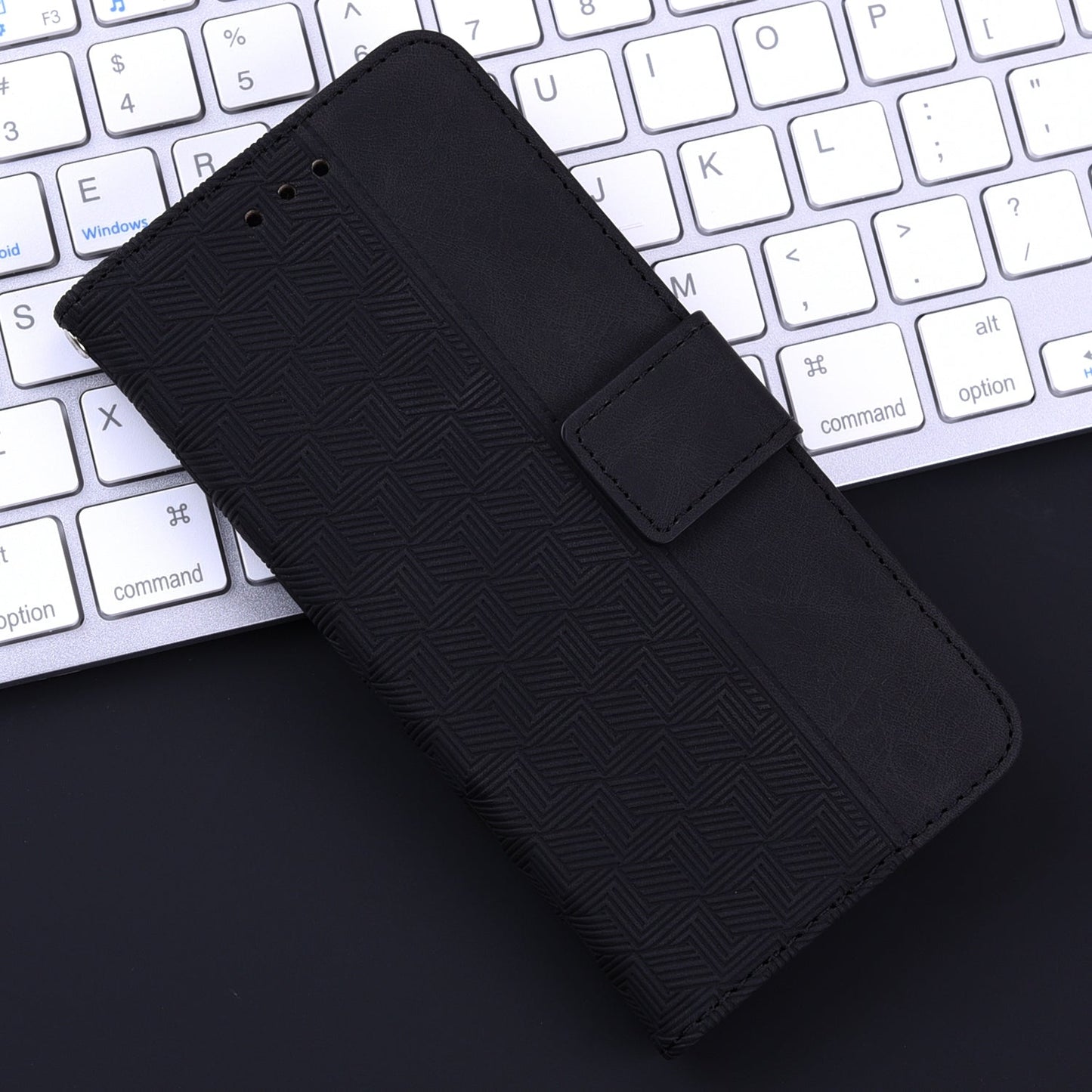 For iPhone 16e Geometric Embossed Leather Phone Case(Black)