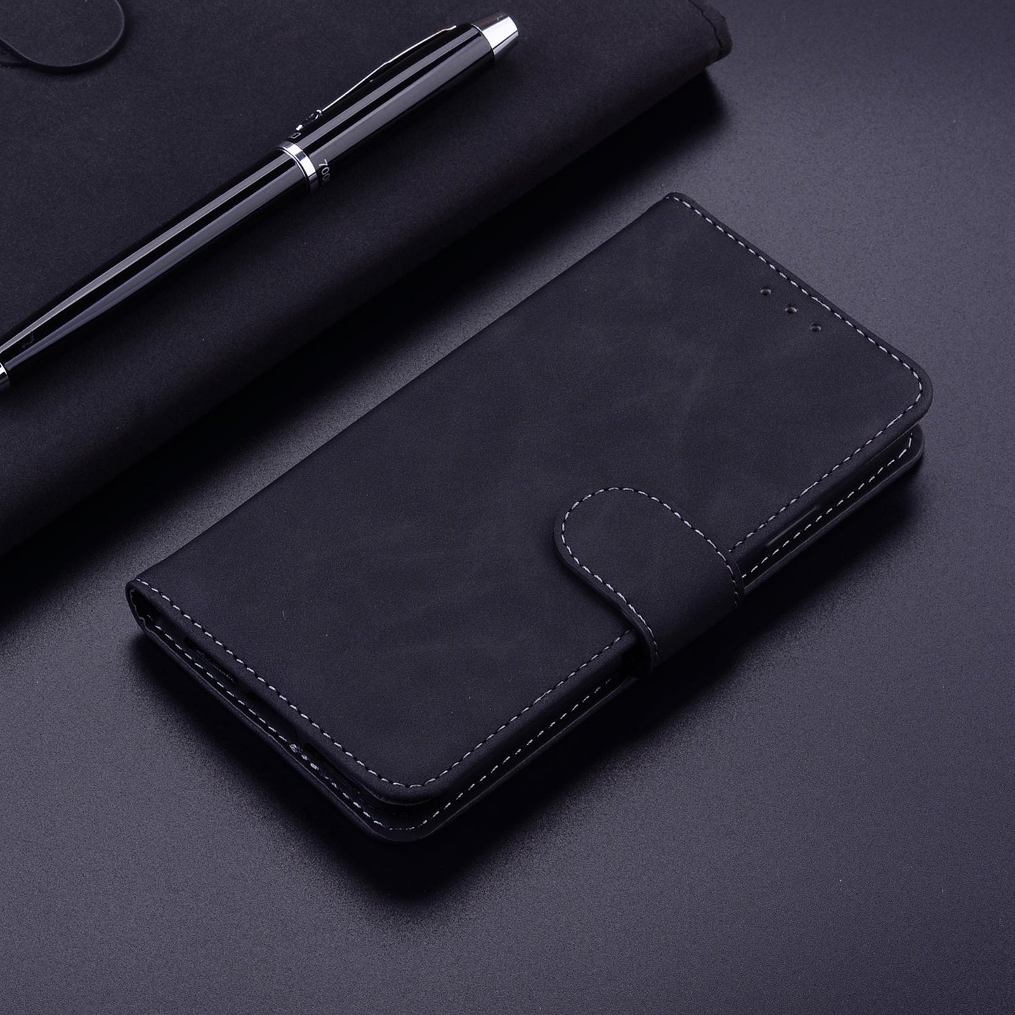 For iPhone 16e Skin Feel Pure Color Flip Leather Phone Case(Black)