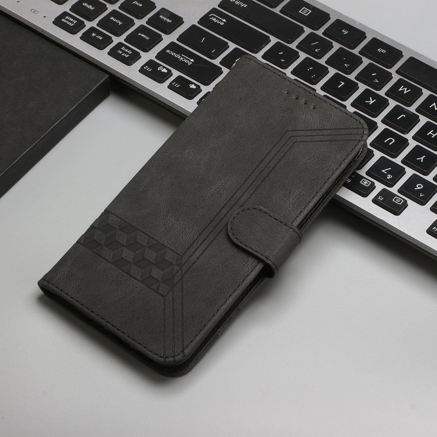 For iPhone 16e Cubic Skin Feel Flip Leather Phone Case(Black)