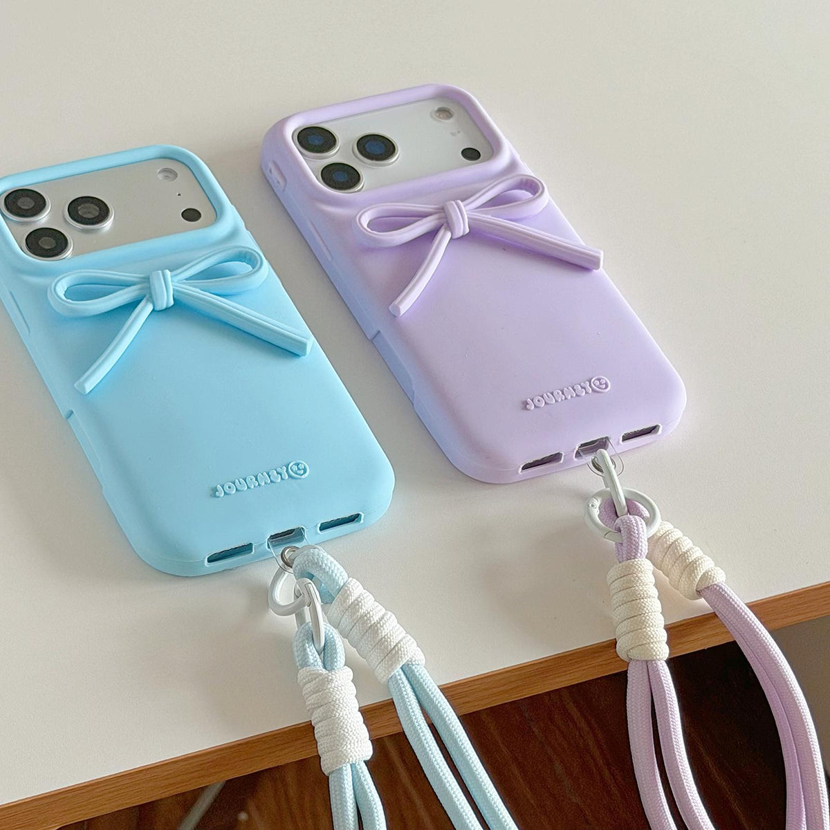 Compatible with iPhone 18 Pro & 17 Pro Bow TPU Dual-Layer PC Bulge Phone Case with Lanyard - White