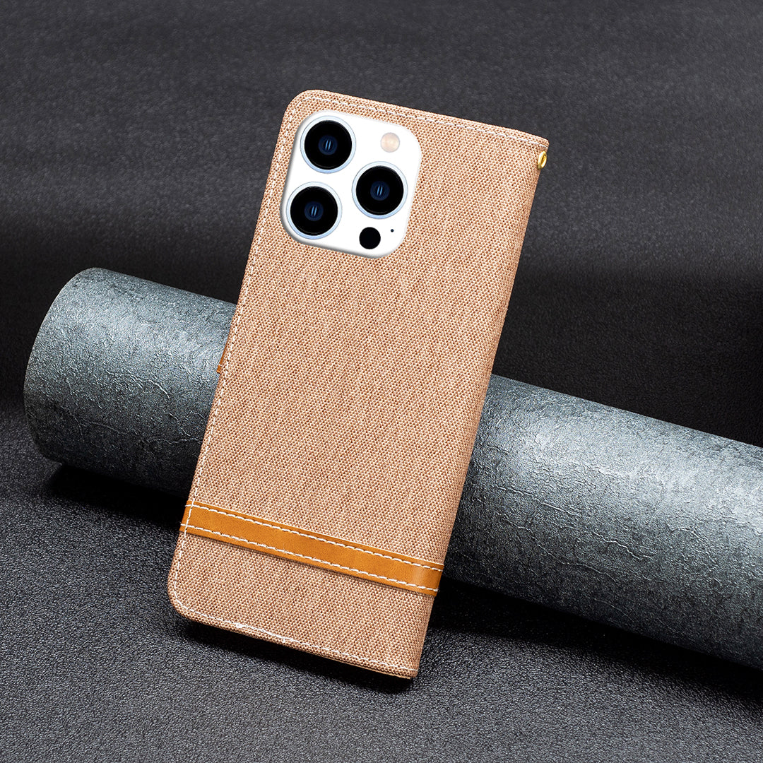 Uniqkart for iPhone 15 Pro Jeans Cloth Splicing PU Leather + TPU Bump Proof Phone Case Wallet Stand Cover - Brown
