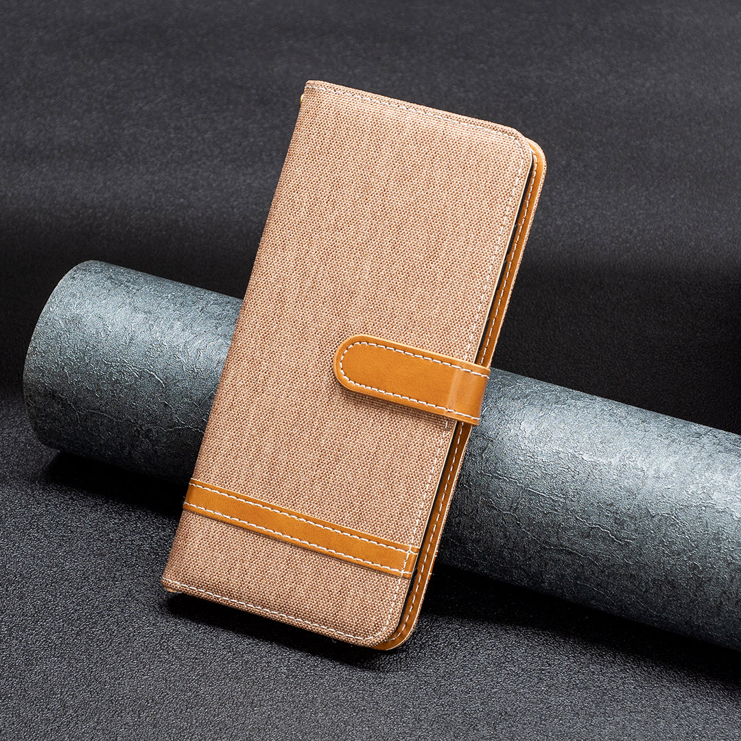 Uniqkart for iPhone 15 Jeans Cloth Splicing PU Leather + TPU Phone Case Wallet Stand Anti-scratch Cover - Brown