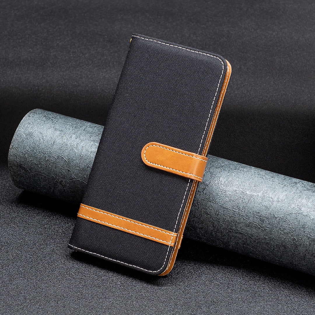 Uniqkart for iPhone 15 Jeans Cloth Splicing PU Leather + TPU Phone Case Wallet Stand Anti-scratch Cover - Black