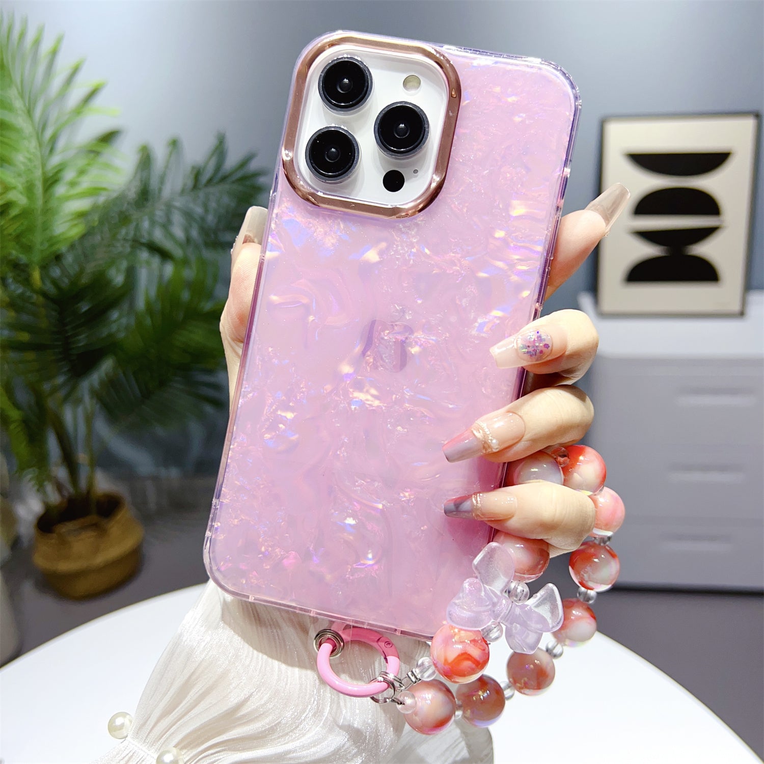 Uniqkart for iPhone 14 Pro Shell Pattern IMD Case TPU+PC Phone Cover with Pearl Hand Chain - Light Pink