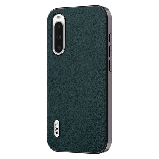 Uniqkart for Sony Xperia 10 V Genuine Cow Leather Coated PC+TPU Cover Litchi Texture Phone Case - Midnight Green