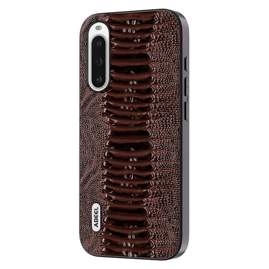 Uniqkart For Sony Xperia 10 V Genuine Cow Leather Coated Crocodile Texture Cover PC+TPU Phone Case - Coffee