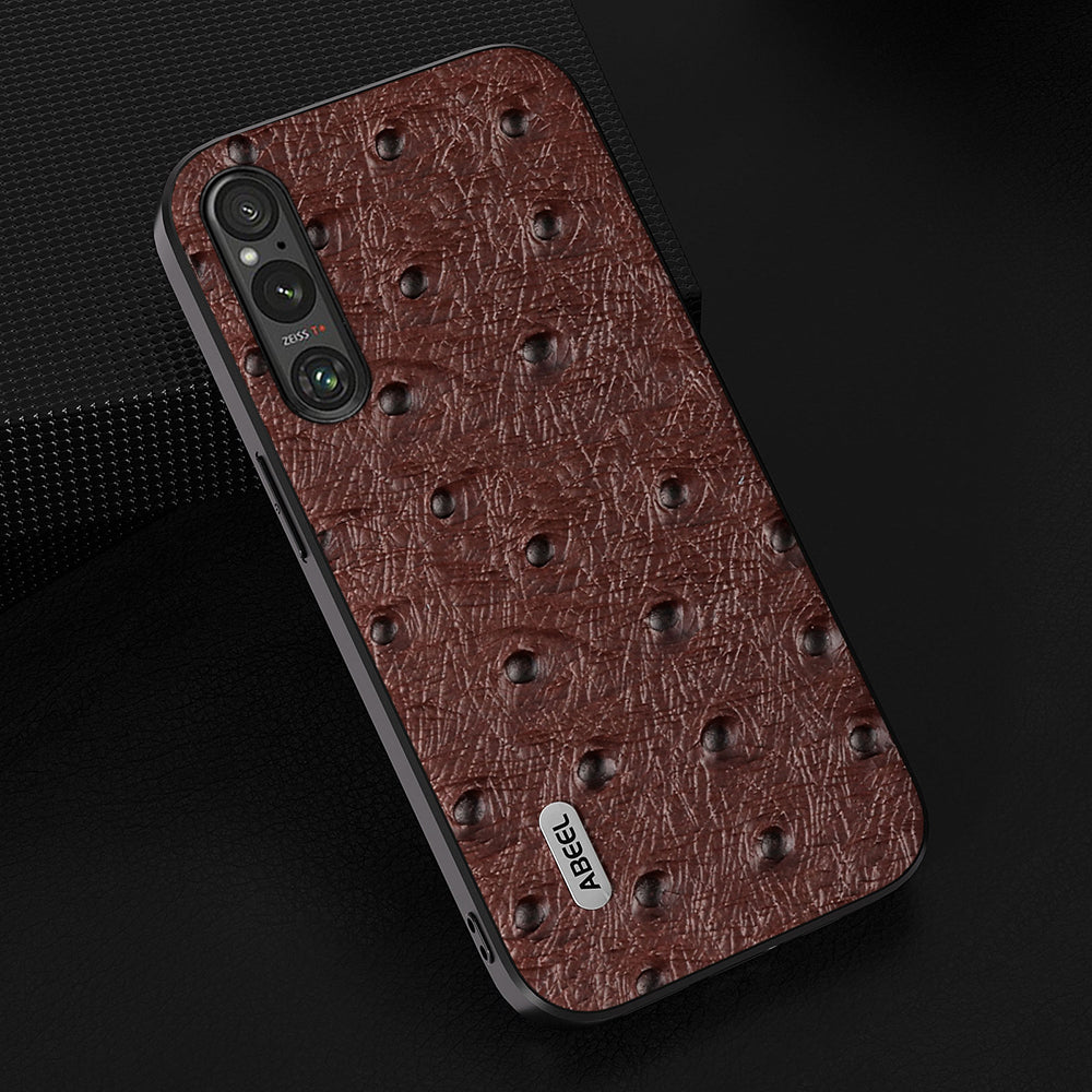 Uniqkart For Sony Xperia 1 V Ostrich Texture Genuine Cow Leather Coated Phone Case PC+TPU Back Cover - Coffee