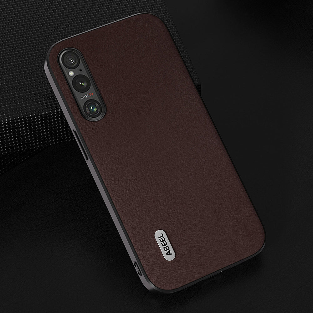 Uniqkart For Sony Xperia 1 V Nappa Texture Genuine Cow Leather Coated Case PC+TPU Phone Cover - Coffee