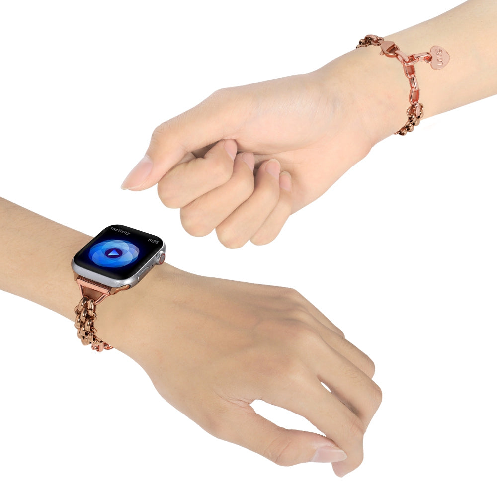 for Apple Watch Ultra 49mm / Series 8 45mm / 7 45mm / 6 / 5 / 4 / SE 44mm / SE (2022) 44mm / 3 / 2 / 1 42mm Three Row Watch Strap Stainless Steel Wrist Band Bracelet with Heart Shape Pendant - Rose Gold