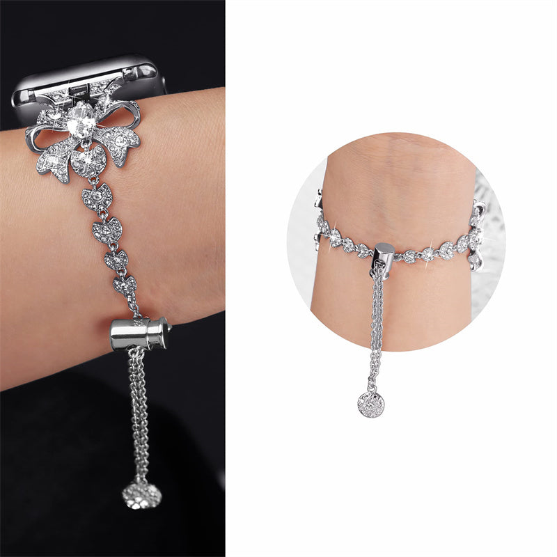 for Apple Watch Series 8 / 7 41mm / 6 / 5 / 4 / SE / SE (2022) 40mm / 3 / 2 / 1 38mm Rhinestones Decor Bowknot Bracelet Metal Watch Strap Adjustable Wrist Band - Silver