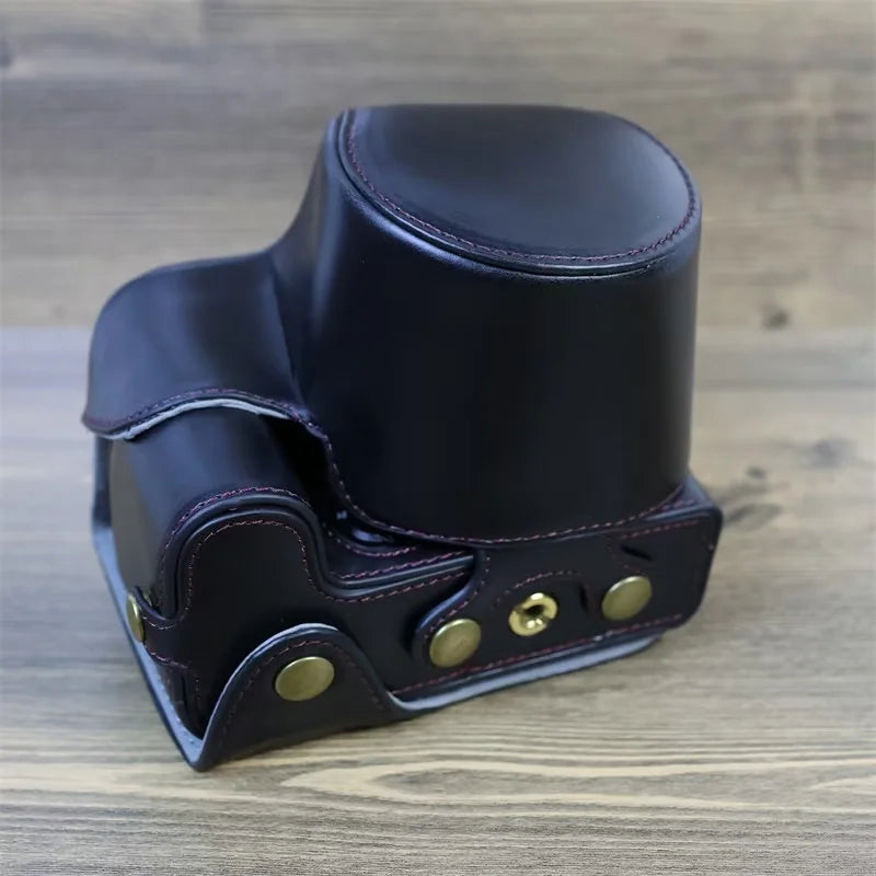 PU Leather Camera Case Bag for Canon EOS R10, Battery Opening Design Protective Cover with Lens Pouch and Strap - Black