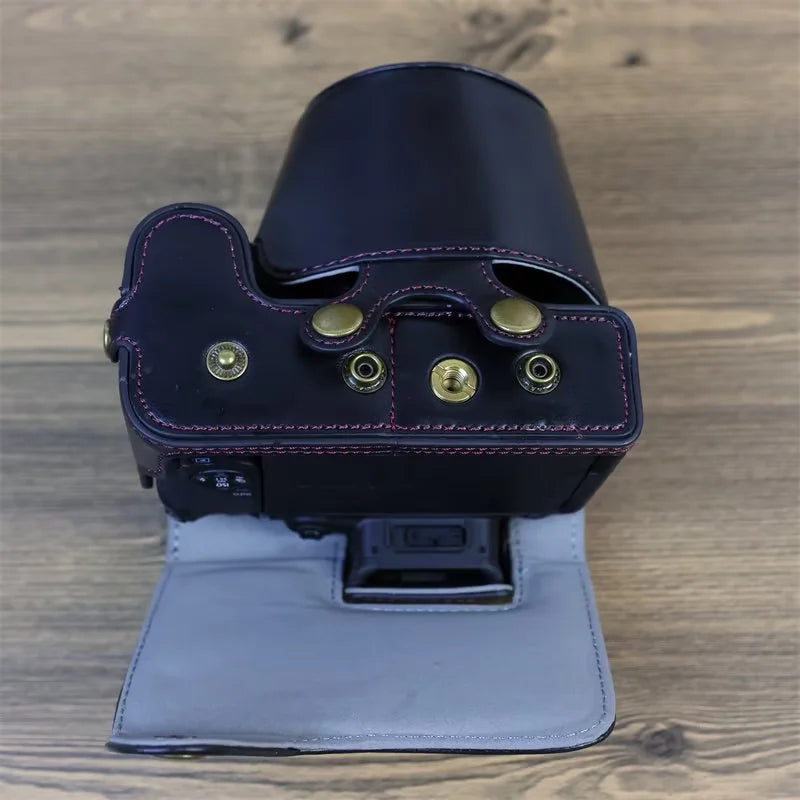 PU Leather Camera Case Bag for Canon EOS R10, Battery Opening Design Protective Cover with Lens Pouch and Strap - Black