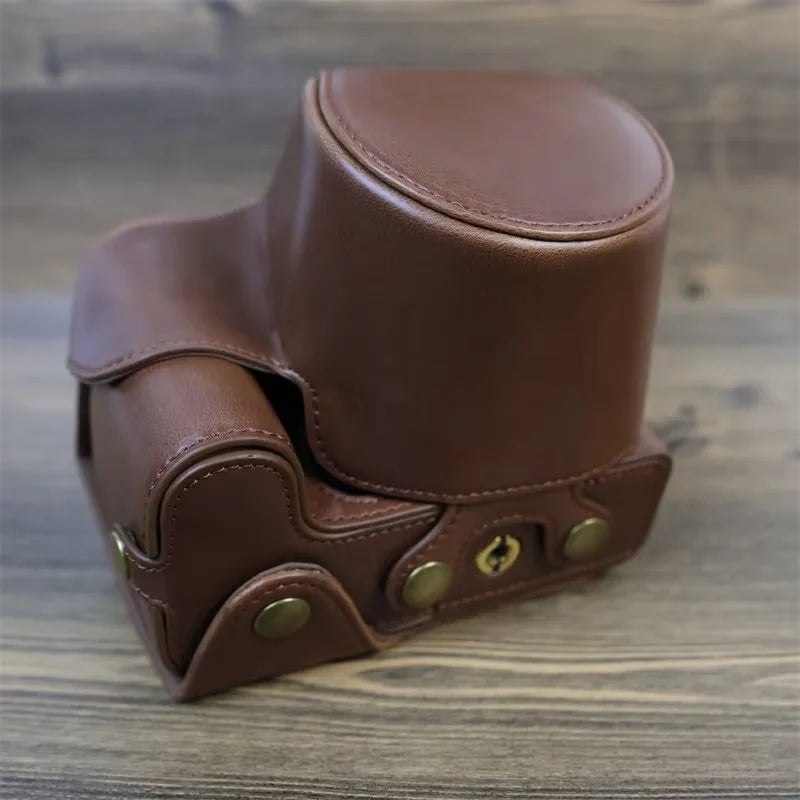 PU Leather Camera Case Bag for Canon EOS R10, Battery Opening Design Protective Cover with Lens Pouch and Strap - Coffee