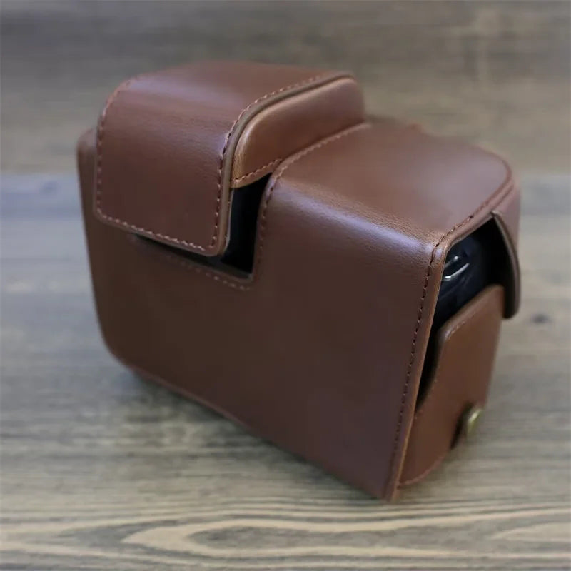 PU Leather Camera Case Bag for Canon EOS R10, Battery Opening Design Protective Cover with Lens Pouch and Strap - Coffee