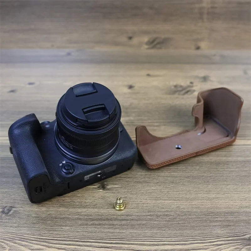 PU Leather Camera Case Bag for Canon EOS R10, Battery Opening Design Protective Cover with Lens Pouch and Strap - Coffee