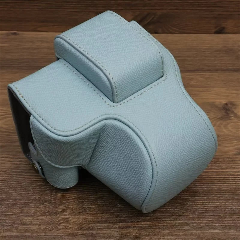 Uniqkart for Canon EOS R50 Camera Case Battery Opening Design Palm Texture Leather Bag with Strap and Small Bag - Baby Blue
