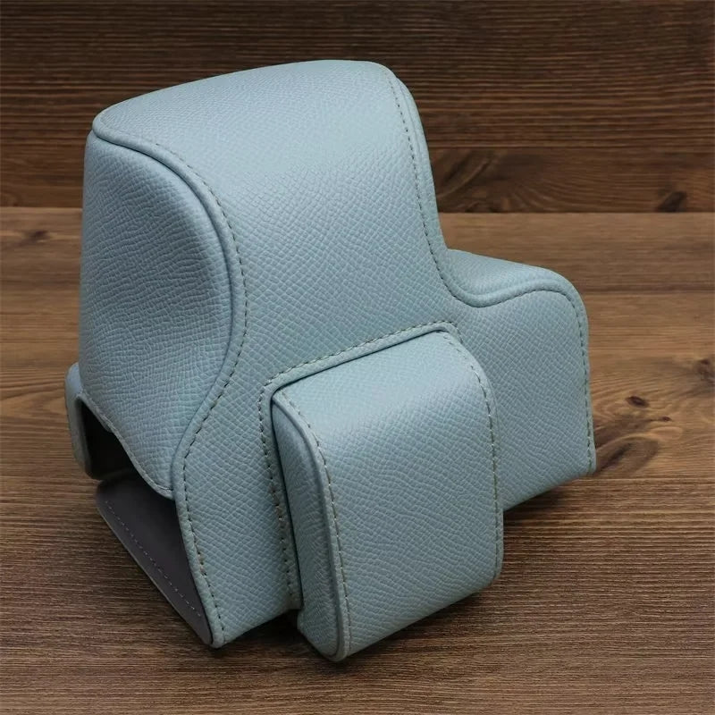 Uniqkart for Canon EOS R50 Camera Case Battery Opening Design Palm Texture Leather Bag with Strap and Small Bag - Baby Blue