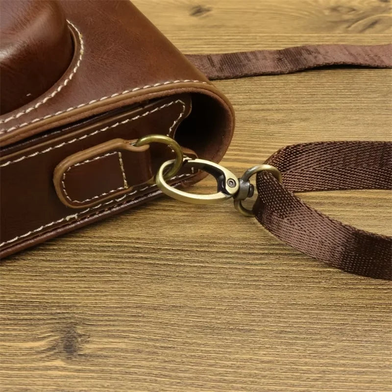 Uniqkart for Sony ZV-1 / ZV-1 II / ZV-1F PU Leather Camera Bag Protective Cover with Shoulder Strap, Vertical Type - Brown