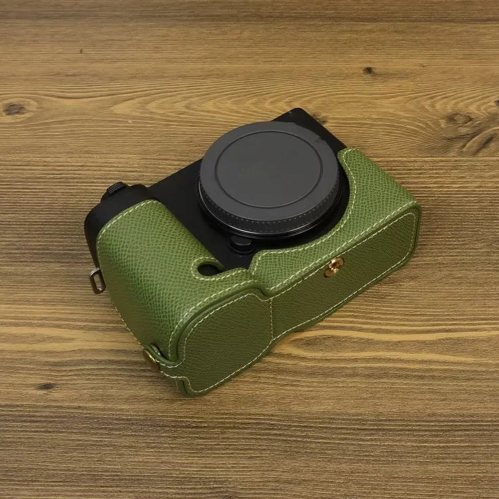 Uniqkart for Sony ZV-E1 Battery Opening Design PU Leather Camera Bottom Cover Half Body Case with Hand Strap - Green