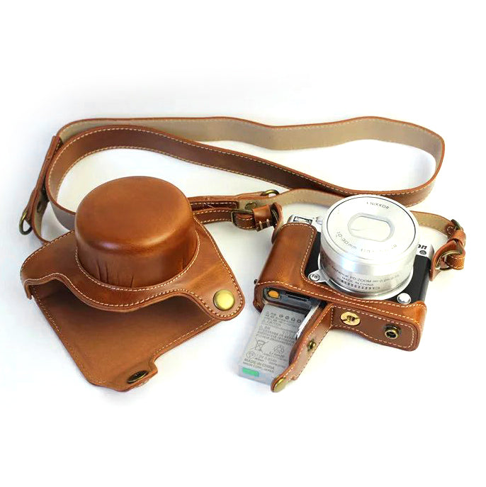 Protective PU Leather Camera Case Bag with Shoulder Strap for Nikon J5 (10-30mm) - Brown