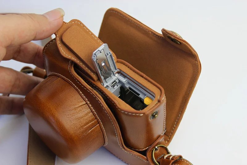 Protective PU Leather Camera Case Bag with Shoulder Strap for Nikon J5 (10-30mm) - Brown