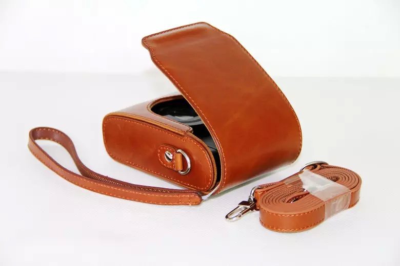 Universal PU Leather Camera Protective Pouch + Strap for Leica / Panasonic / Fuji / Canon, Size: 11x6.5x3.5cm  - Brown
