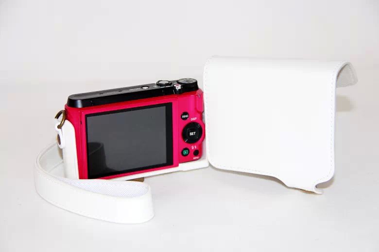 Protective Leather Camera Cover Casing with Shoulder Strap for Casio ZR1000/1200/1100/1500 - White