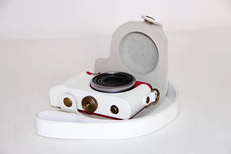 Protective Leather Camera Cover Casing with Shoulder Strap for Casio ZR1000/1200/1100/1500 - White