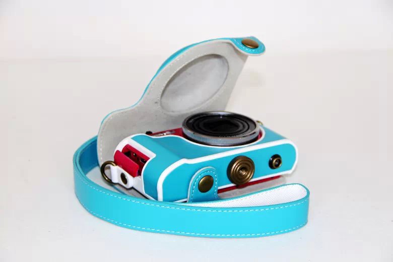PU Leather Camera Case with Shoulder Strap for Casio ZR1000/1200/1100/1500 - Blue
