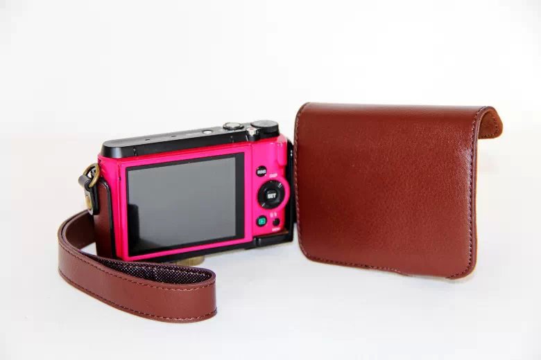 Protective PU Leather Camera Cover Casing with Shoulder Strap for Casio ZR1000/1200/1100/1500 - Coffee