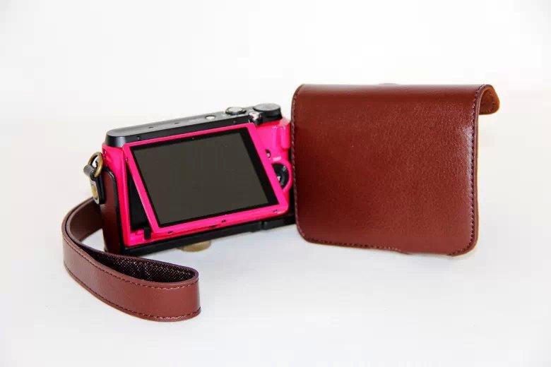 Protective PU Leather Camera Cover Casing with Shoulder Strap for Casio ZR1000/1200/1100/1500 - Coffee
