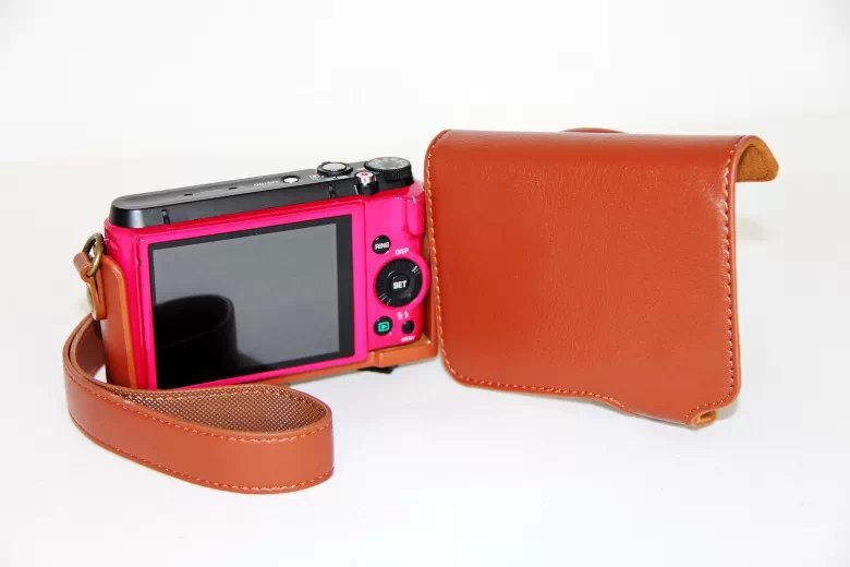 Protective PU Leather Camera Cover Casing + Shoulder Strap for Casio ZR1000/1200/1100/1500 - Brown