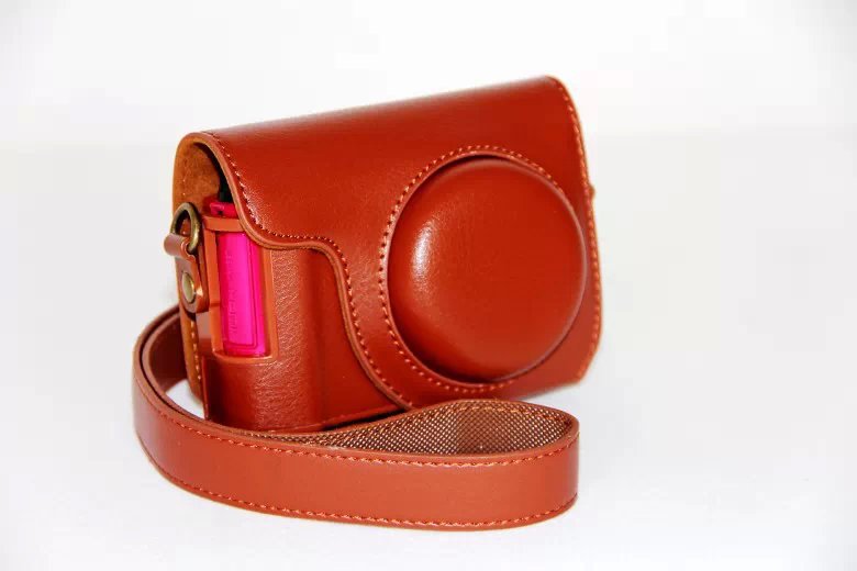Protective PU Leather Camera Cover Casing + Shoulder Strap for Casio ZR1000/1200/1100/1500 - Brown