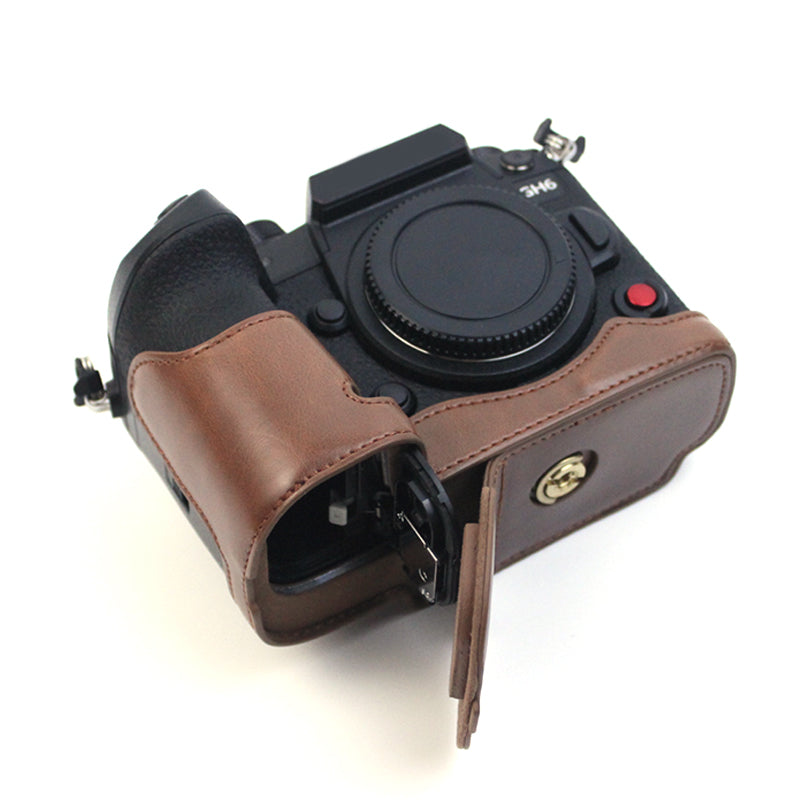 Uniqkart for Panasonic LUMIX GH6/DC-GH6GK Fashionable PU Leather Camera Bottom Case Battery Opening Design Protective Half Body Cover - Coffee